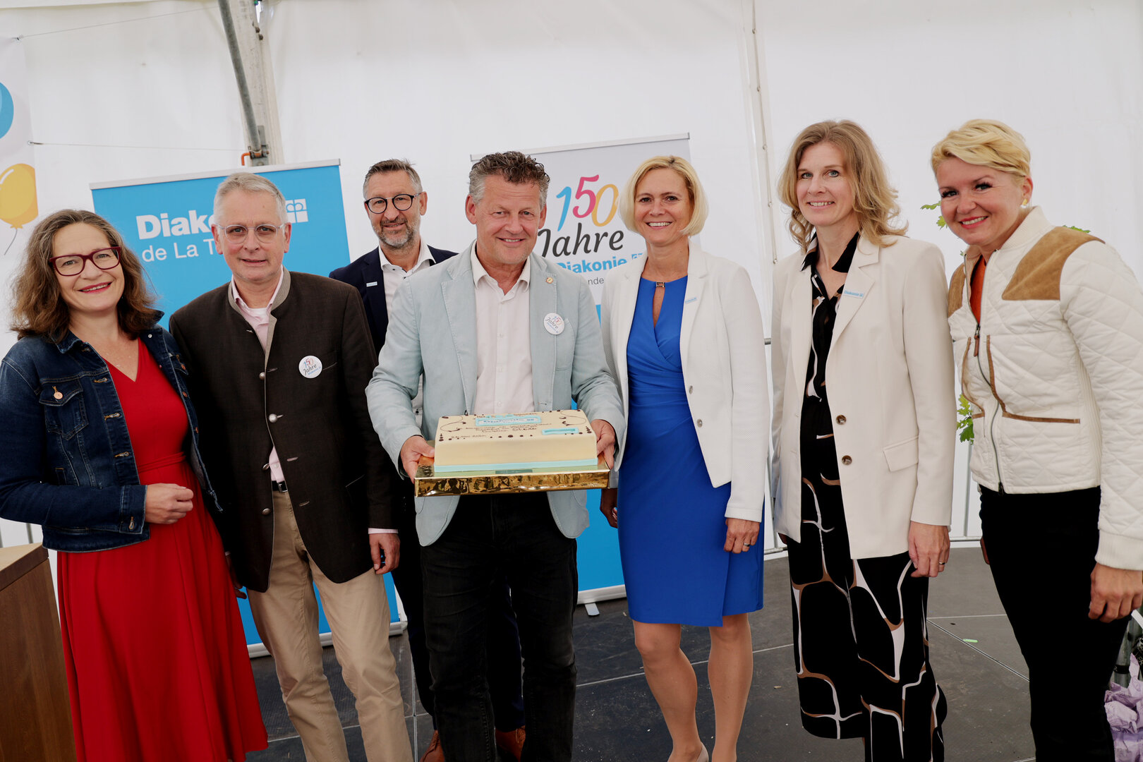 Stadträtin DI Constance Mochar, Vzbgm. Dr. Alexander Kastner, Mag. Walter  Pansi (Vorstand Diakonie de La Tour), Bürgermeister Christian Scheider, MMag. Susanne  Prentner-Vitek (Vorstand Diakonie de La Tour), Pfarrerin DI Mag. Astrid Körner (Vorstand  Diakonie de La Tour) und Stadträtin Sandra Wassermann, BA, bei den 150-Jahr  Feierlichkeiten der Diakonie de La Tour.  Foto: StadtKommunikation / Wajand