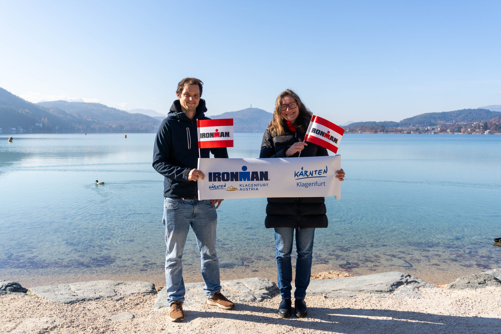 Renndirektor Patrick Schörkmayer und Sportstadträtin DI Constance Mochar freuen sich schon auf die 27. Auflage des Ironman Austria in Klagenfurt am 14. Juni. Foto: StadtKommunikation/Zechner