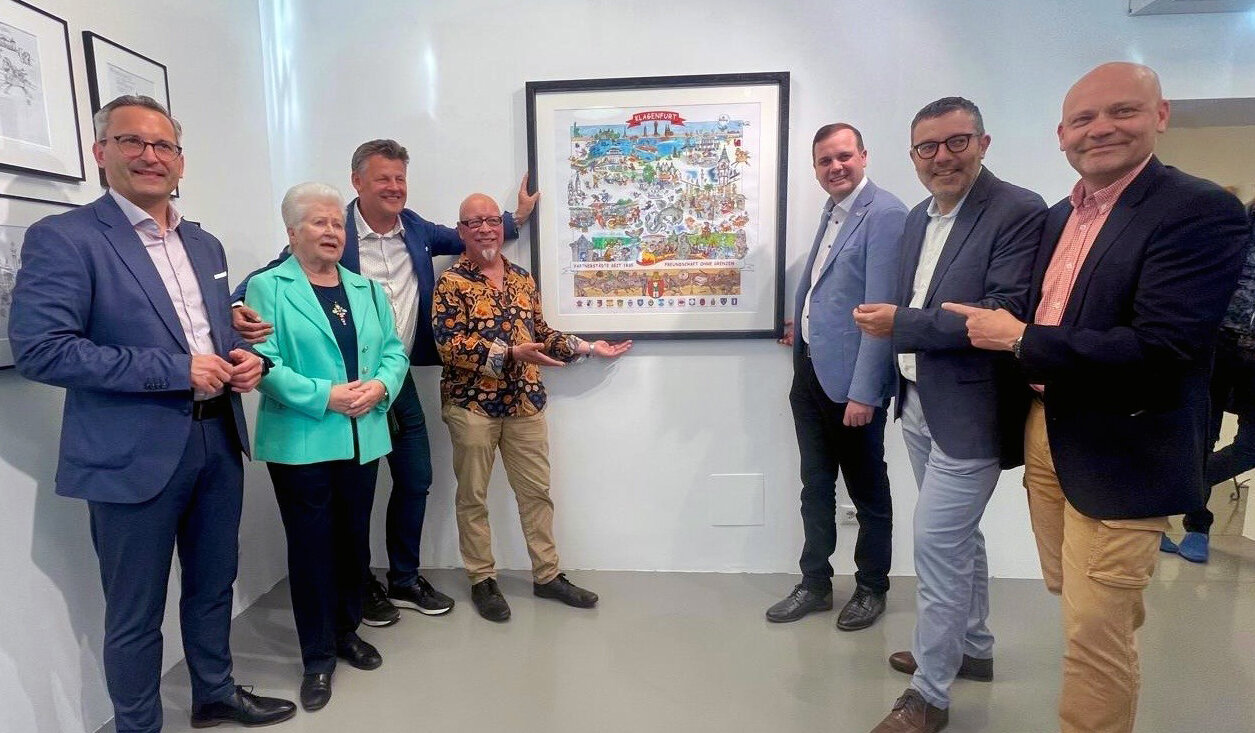 Kulturstadtrat Mag. Franz Petritz, Bürgermeister Christian Scheider, Vizebürgermeister Patrick Jonke, die Gemeinderäte Mag. Manfred Jantscher und Mag. Martin Lemmerhofer enthüllten das neue, außergewöhnliche Wimmelbild in der Galerie Art IST mit Künstler Andreas Ganther und Monika Behnke.