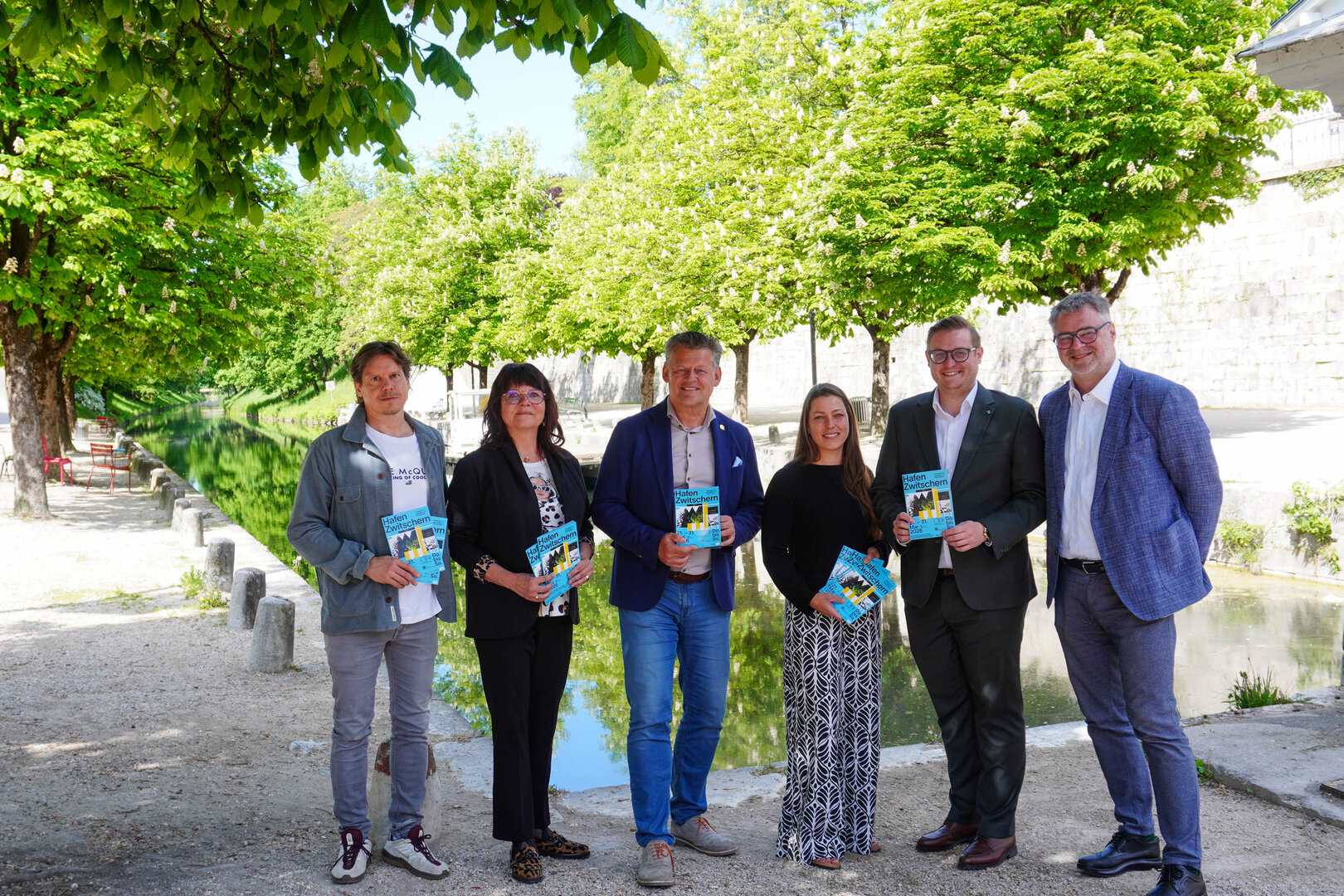 v.l.n.r. Michael Pontasch-Müller (Geschäftsführer Hafenstadt Urban Area), Inga Horny (Geschäftsführerin Klagenfurt Marketing GmbH), Bürgermeister Christian Scheider, Julia Jöbstl (Programmgestaltung Hafenzwitschern), Tourismus- und Wirtschaftsstadtrat Julian Geier und Adi Kulterer (Vorsitzender Tourismusverband Klagenfurt). Bild: StadtKommunikation/Zechner