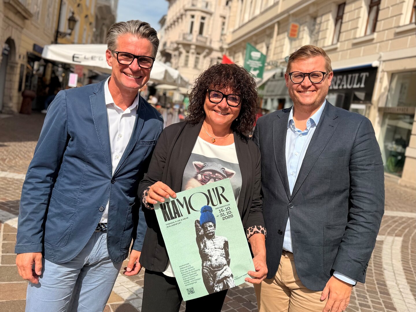 Bildtext: Wirtschaftsreferent Stadtrat Julian Geier, WKK Bezirks-Obmann Franz Ahm und Klagenfurt Marketing Geschäftsführerin Inga Horny freuen sich über die kommende Neuauflage von KLAMOUR.